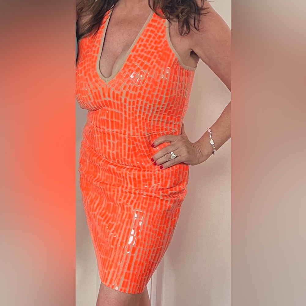 Bcbg size L Orange dress worn once on a red carpet at a fashion show event.